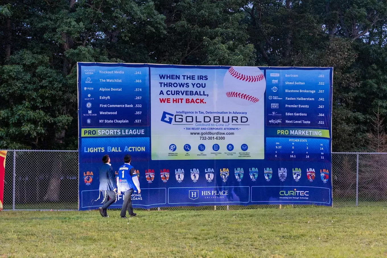 Goldburd tax firm banner at LBA baseball event